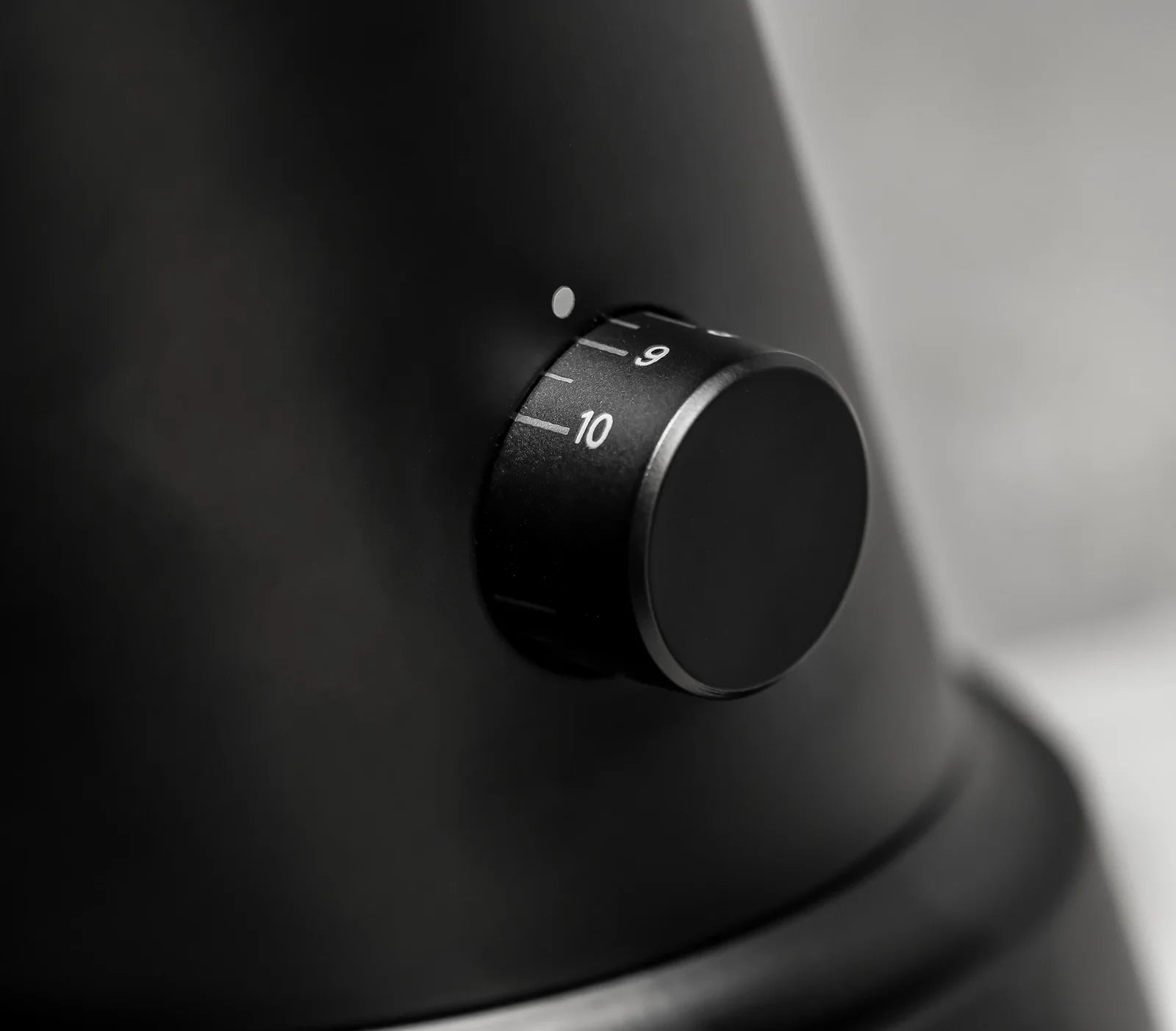 WPM ZP1 Single Dose Grinder grind adjustment dial showing settings from 1 to 10 for precise coffee grinding.